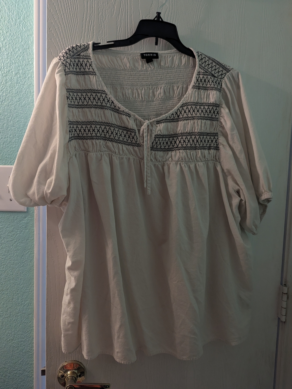 torrid cream peasant tunic with black embroidered yoke
